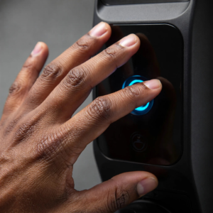 My Ottawa Handyman Person using biometric fingerprint sensor after installing a smart lock
